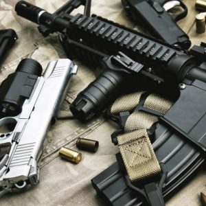 Weapons and military equipment for army, Assault rifle gun (M4A1) and pistol on camouflage background.